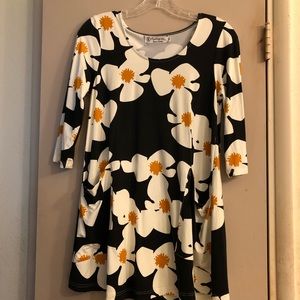 Mini dress/Tunic from local brand in Hawaii. 2 small holes in upper back.